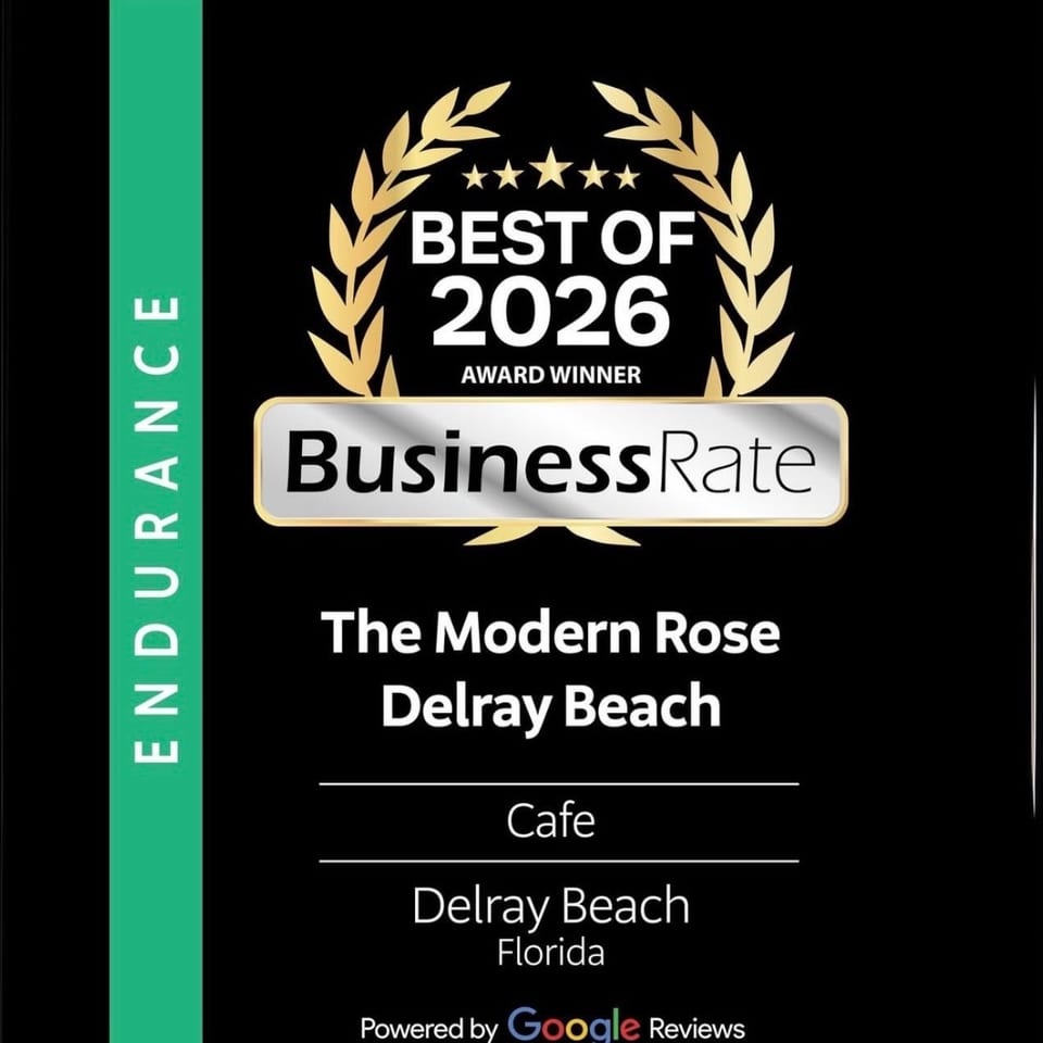 BusinessRate Best of 2026 award graphic recognizing The Modern Rose Cafe in Delray Beach, Florida.