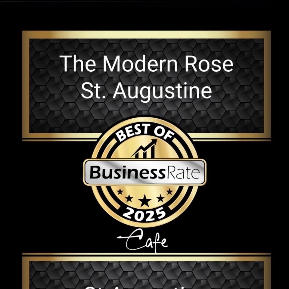 Award graphic celebrating The Modern Rose Cafe in St. Augustine, Florida, as a 2025 BusinessRate Best Of recipient.